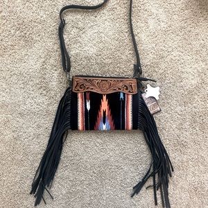 Deliah Fringe purse with real leather detail. NWT